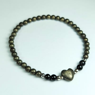 Pulsera De Pirita Y Obsidiana Con Destellos Plateados en Perlas desde 4 mm