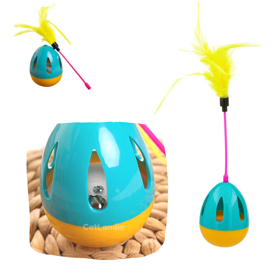 Juguete huevo con pluma