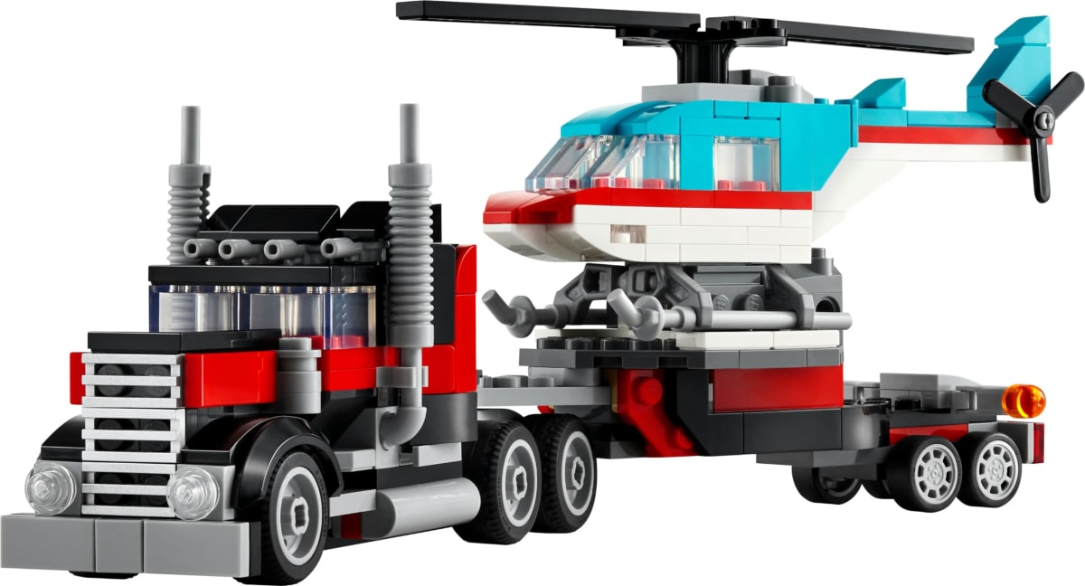 CAMIÓN PLATAFORMA CON HELICÓPTERO1