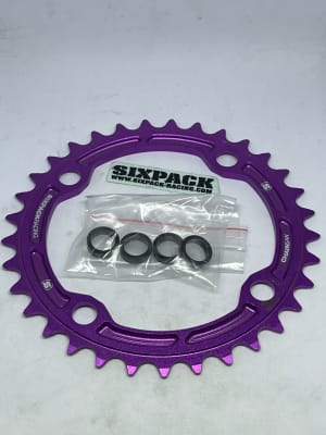 CORONA SIXPACK 33T PURPURA BCD 104 ALUMINIO