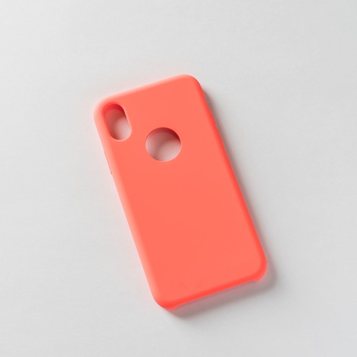 SILICONA SIN LOGO CORAL IPHONE X/XS1