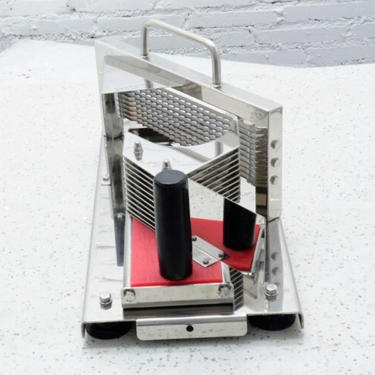 Cortadora rebanadora manual de tomates acero inox. Chica3