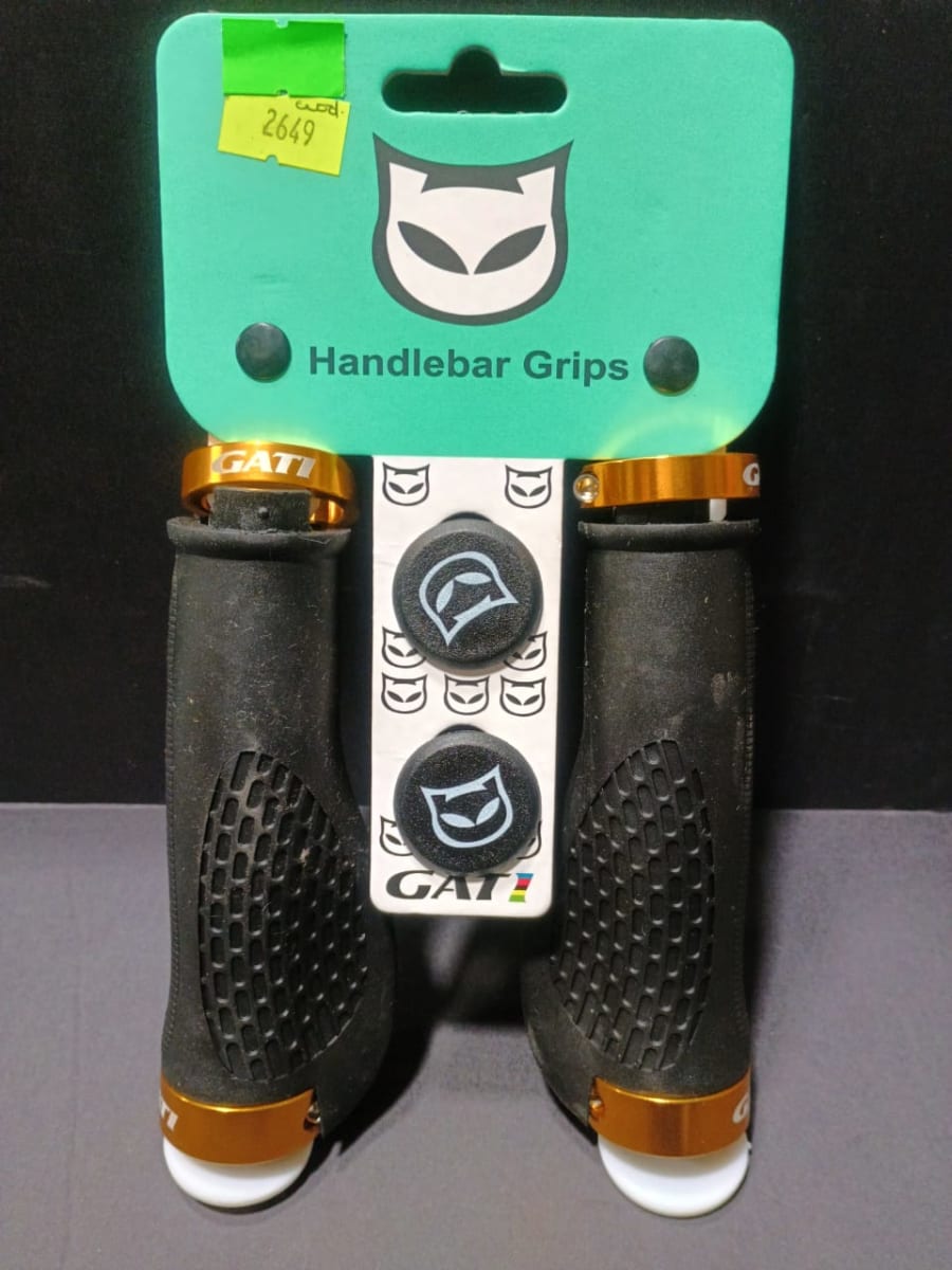 PUÑOS GOMA ERGO GATI NEGRO DOBLE RING DORADO1