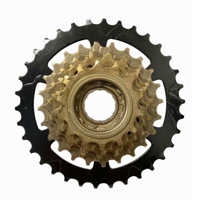 PIÑON FW-734 FOR 7 SPEED 14-34T,COLOR:BR+ED, INDEX WITH FALCON LOGO PACKING:1PCON WHITE BOX1