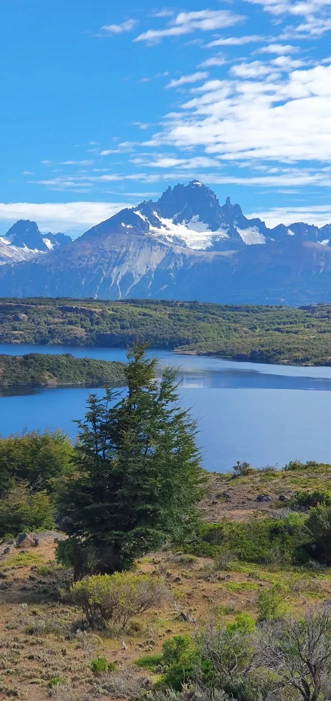 Snow-capped Andes peak above a Patagonian lake in Southern Chile