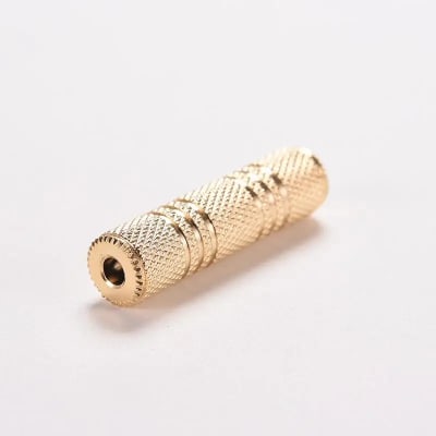 MJMJ ADAPTADOR DORADO 3.5mm MINI JACK HEMBRA A MINI JACK HEMBRA