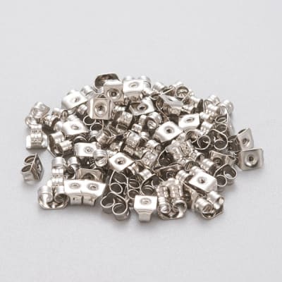 Tapones de aros 5x3.5 mm mariposa acero plateado / gramo