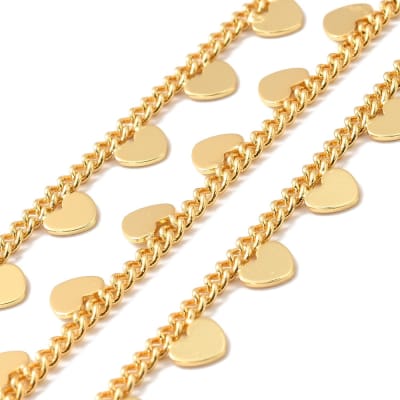 Cadena con corazón y estrella colgante baño de oro / metro