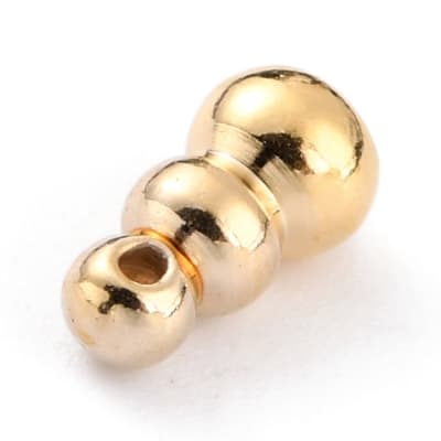 Pasador torre balines calabaza 7.5 mm baño de oro / unidad