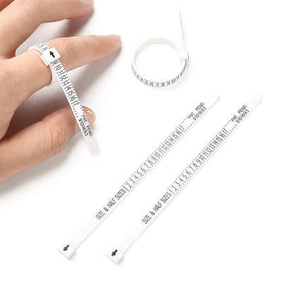 Medidor plástico de dedos para anillos  joyería / unidad