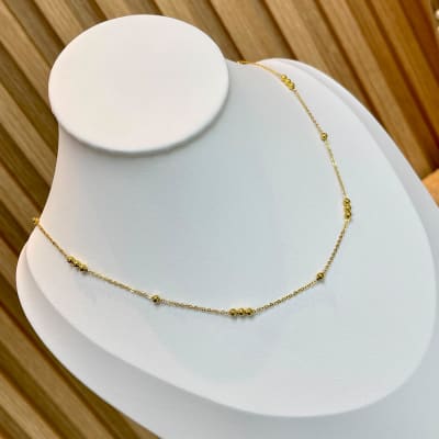 Collar con balines de 3 mm acero dorado / unidad