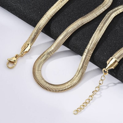 Cadena armada tejido espiga serpiente 6 mm baño oro / unidad