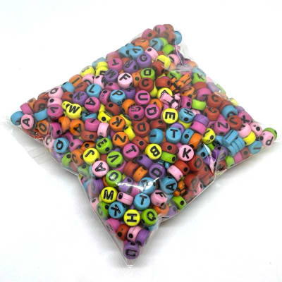Letras plásticas redonda abecedario surtido / 100 grs