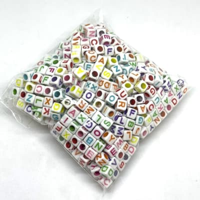 Letras plásticas cubo abecedario surtido / 100 grs