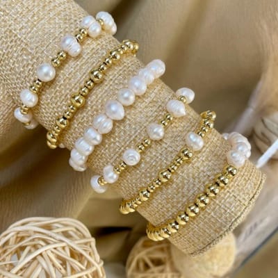 Pulsera elasticada de balines en acero y perlas / unidad