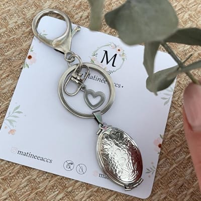 Llavero con relicario cuatro fotos personalizado plateado / unidad