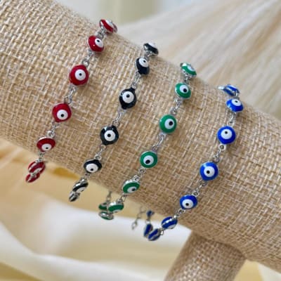 Pulsera protección con ojos turcos nazar en acero plateado / unidad