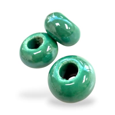Pasador rondela de porcelana orificio grande turquesa 17x10 mm/ unidad