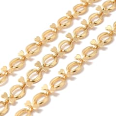 Cadena con ovalos y lazo mini corazones baño de oro / metro 0