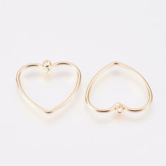 Dije colgante silueta corazón 16 mm baño oro / unidad 0