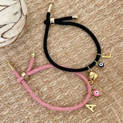 Set de pulseras pareja inicial corazón imantado ojo turco / set 0