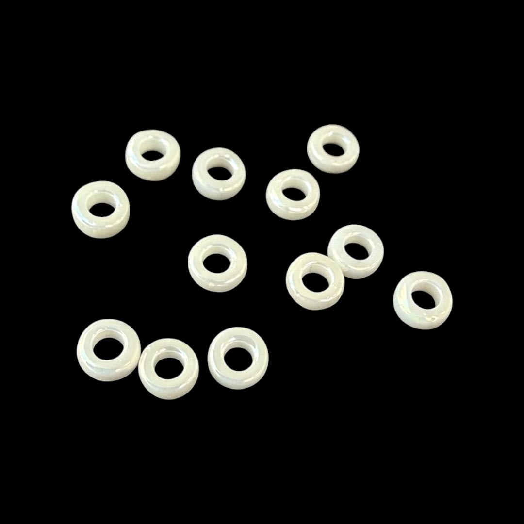 Cuentas mostacilla miyuki spacer 3x1.3 mm ivory ceylon / gramo1