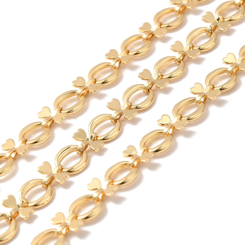 Cadena con ovalos y lazo mini corazones baño de oro / metro1