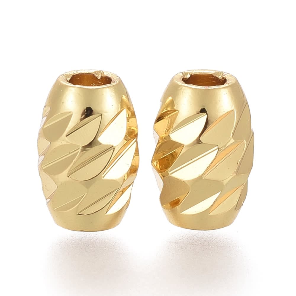 Separador forma de arroz textura 7x5 mm baño oro / unidad2