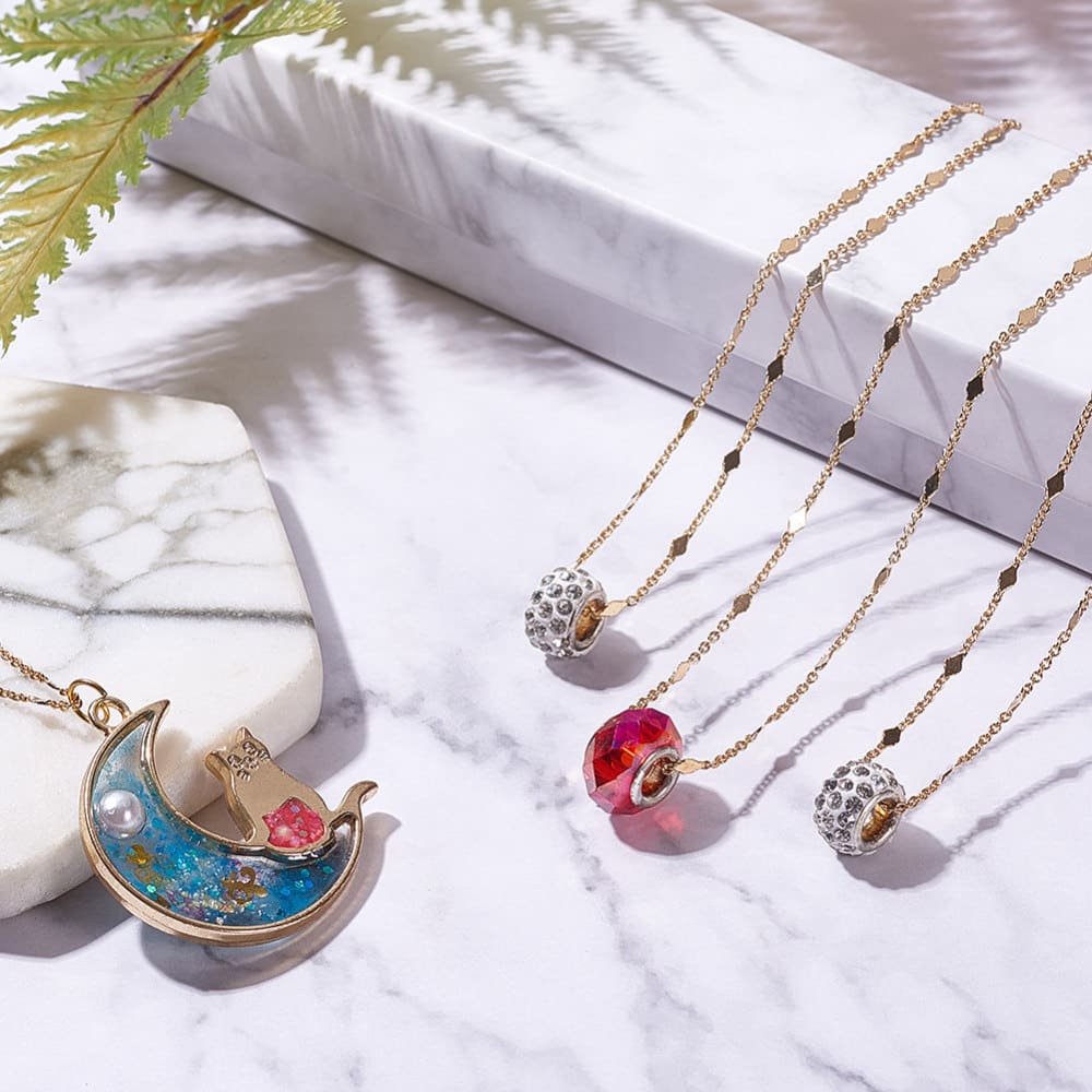 Cadena eslabón rombo 1.5 mm baño de oro / metro5