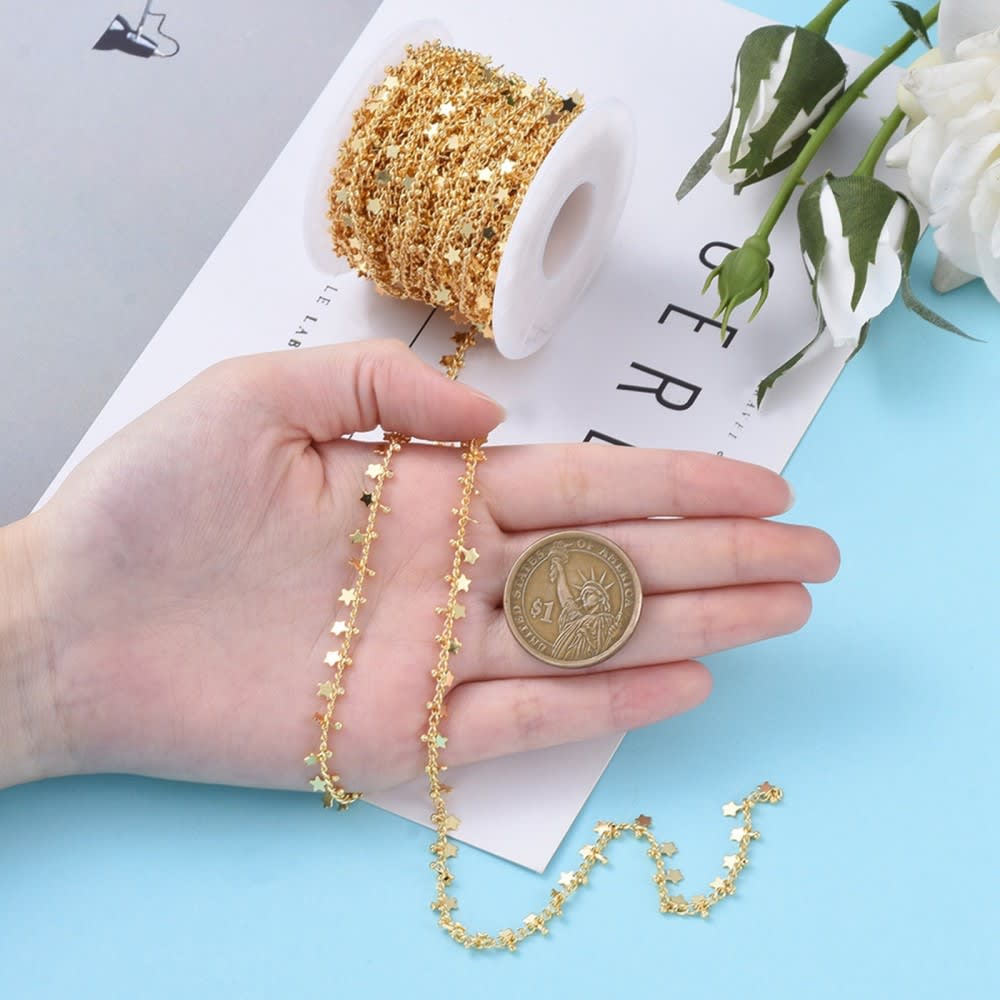 Cadena mini estrellas colgantes baño de oro platino / metro3