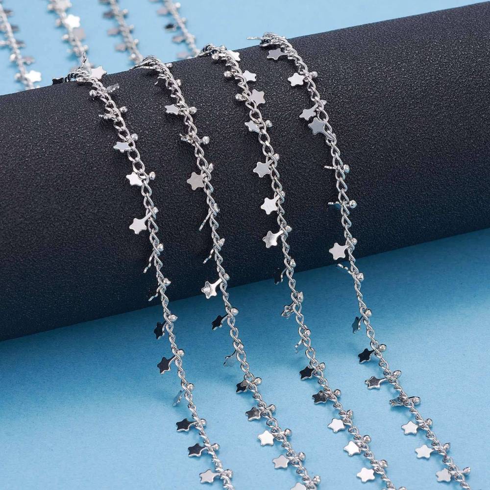 Cadena mini estrellas colgantes baño de oro platino / metro6