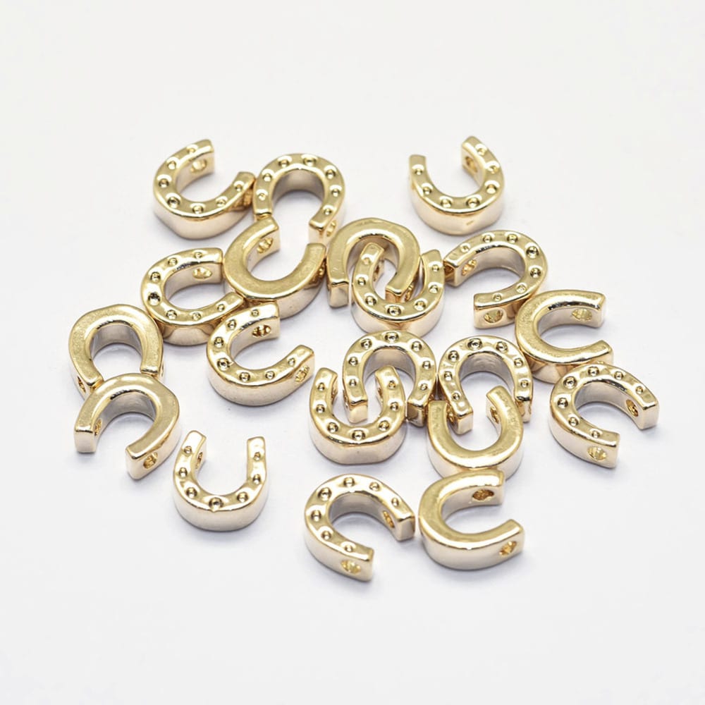 Pasador herradura amuleto 7 mm baño de oro / unidad2