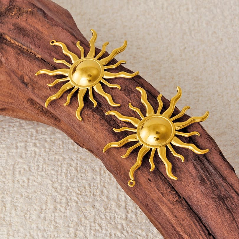 Dije colgante sol 43 mm acero dorado / unidad3