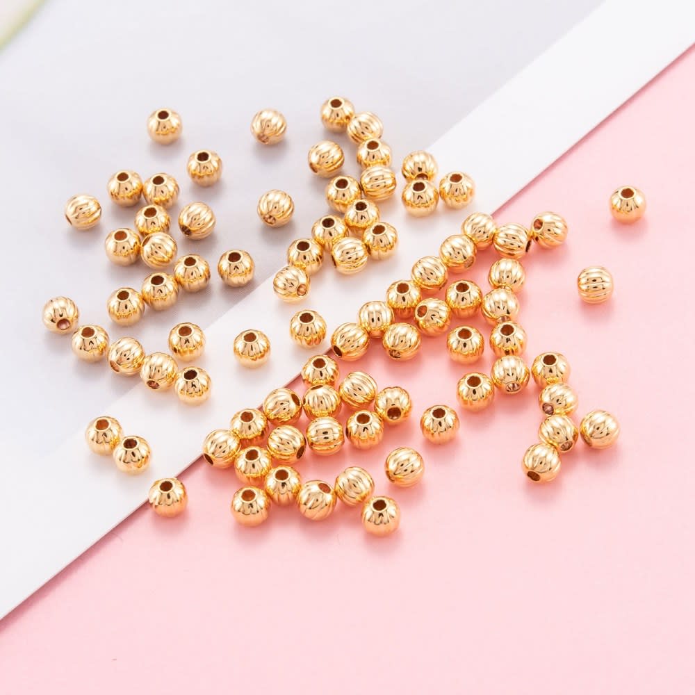 Balines 4 mm corrugado Baño de oro / gramo3