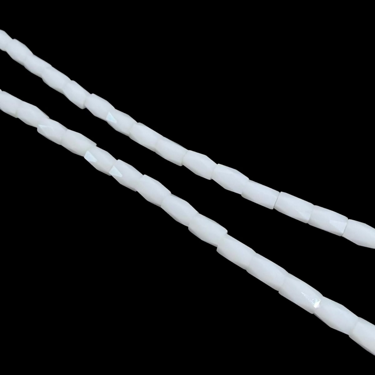 Sarta cristales 5x2 mm murano cilindro facetado unicolor / tira7