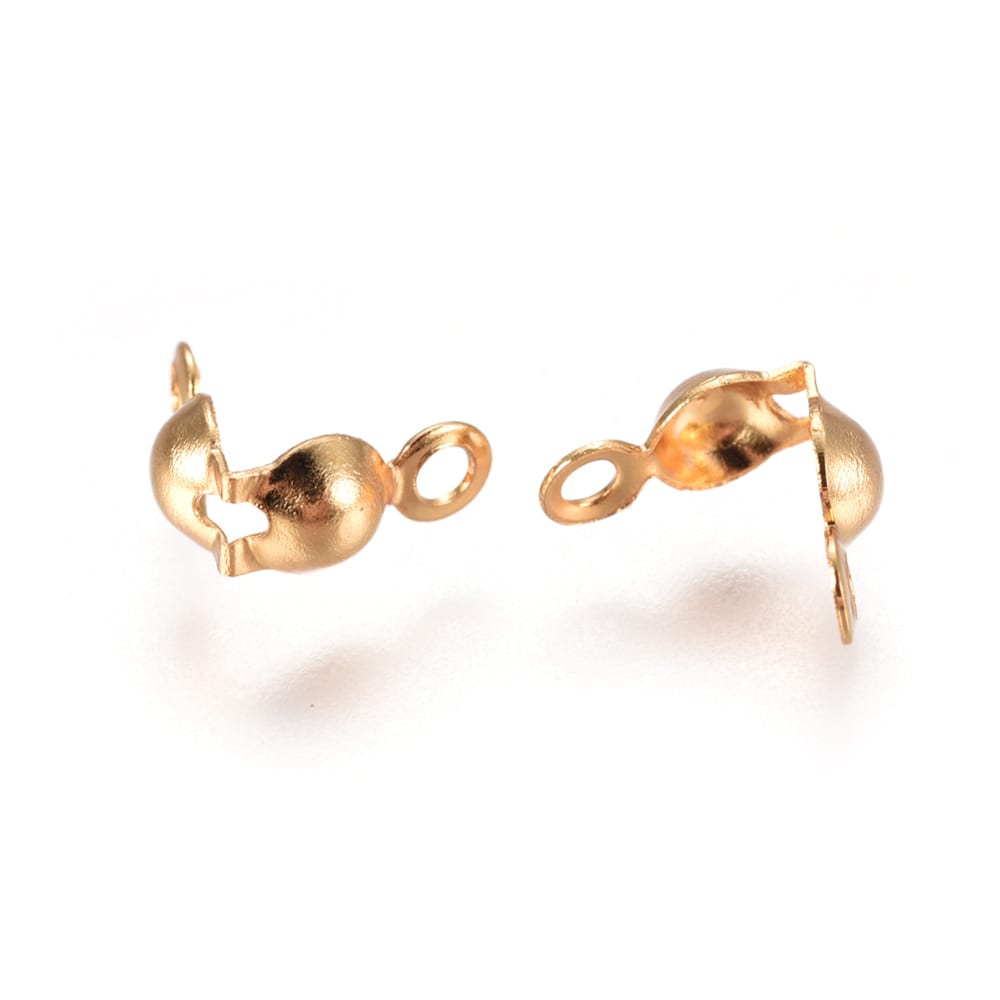 Tapa nudos 7.5x4 mm acero dorado / gramo2