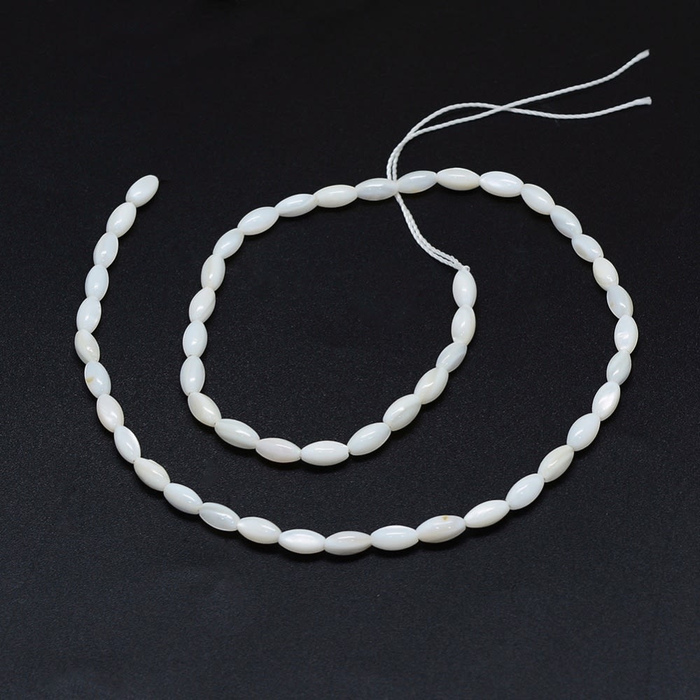 Sarta abalorios cuentas perla nacar alargada 8x4mm / tira2