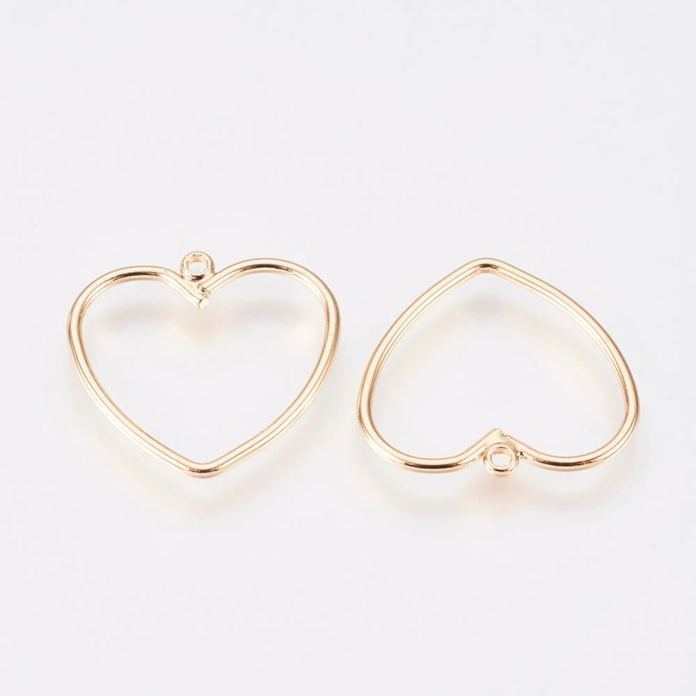 Dije colgante silueta corazón 16 mm baño oro / unidad1