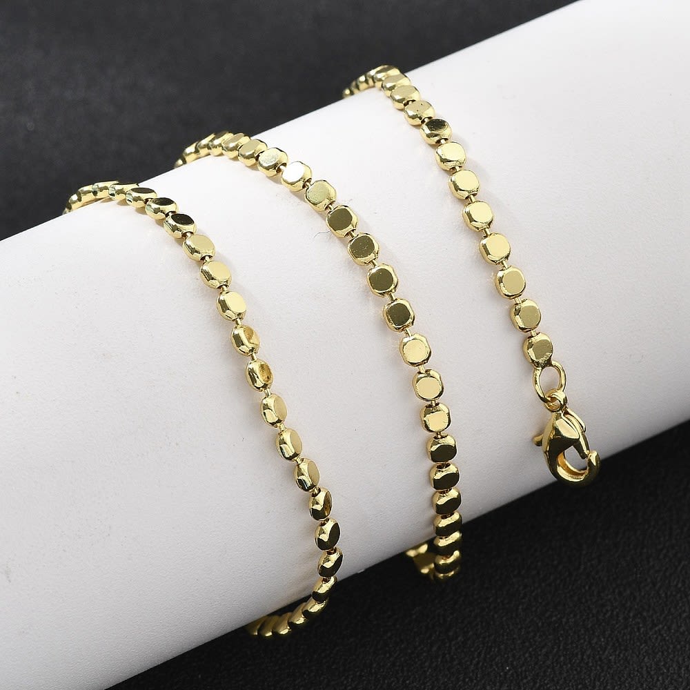 Cadena armada tejido balines planos 2.5 mm baño oro / unidad3