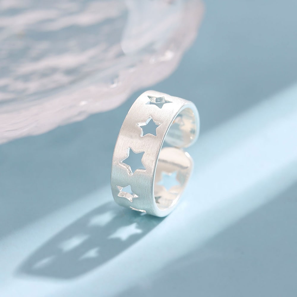 Anillo ajustable estrella calada baño plata / unidad2