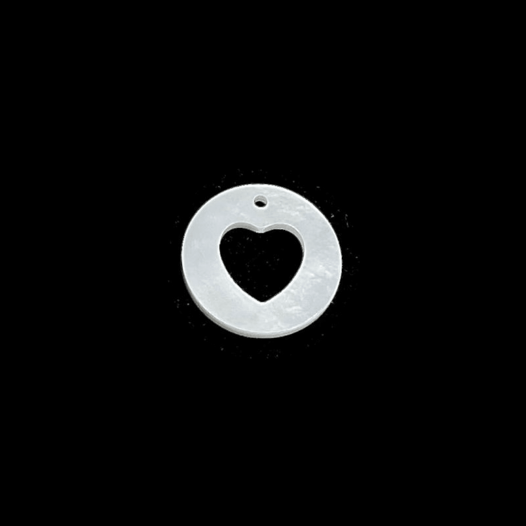 colgante círculo estrella cruz luna corazón carita nacar / unidad4
