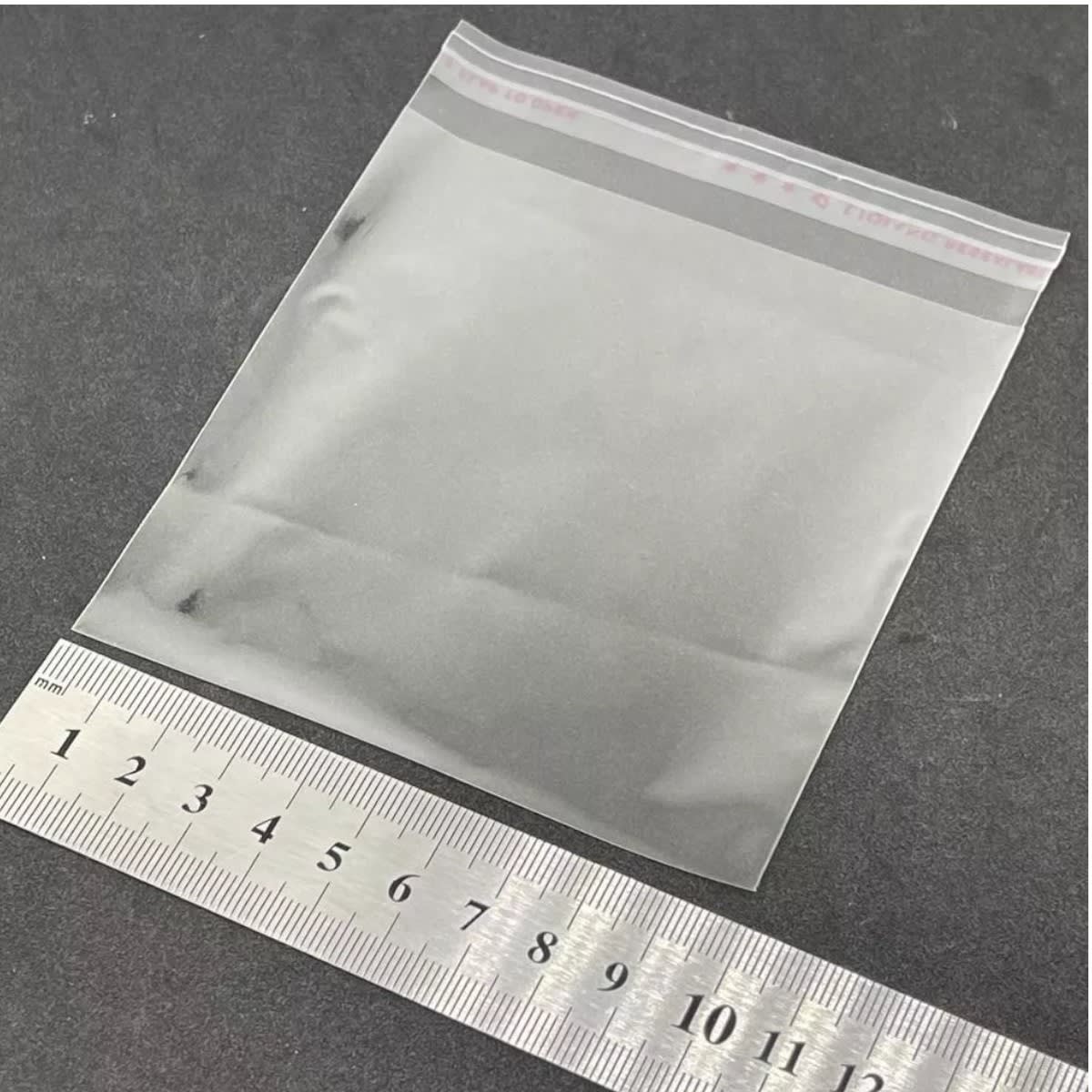 Pack de 500 bolsas celofán adhesiva 10x10 cm2