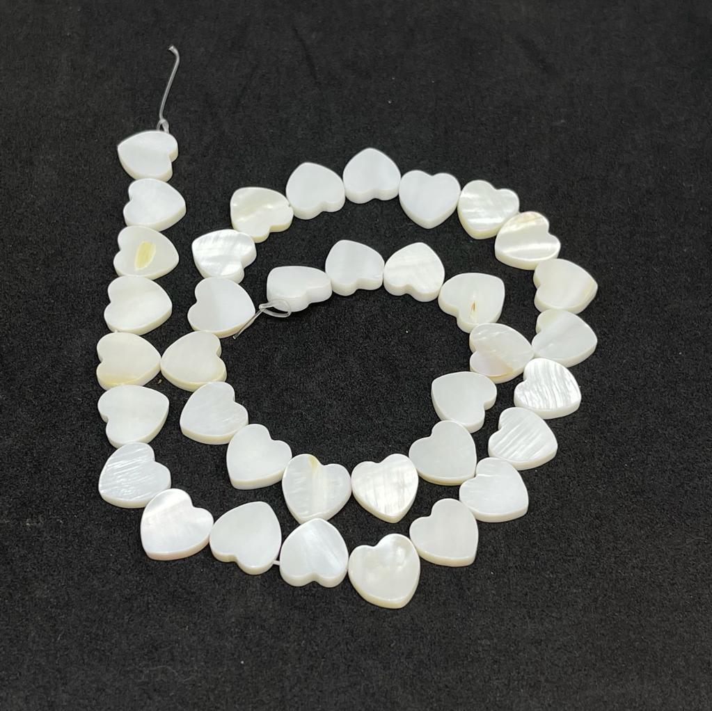 Abalorios cuentas figura corazón nacar 6-10 mm1