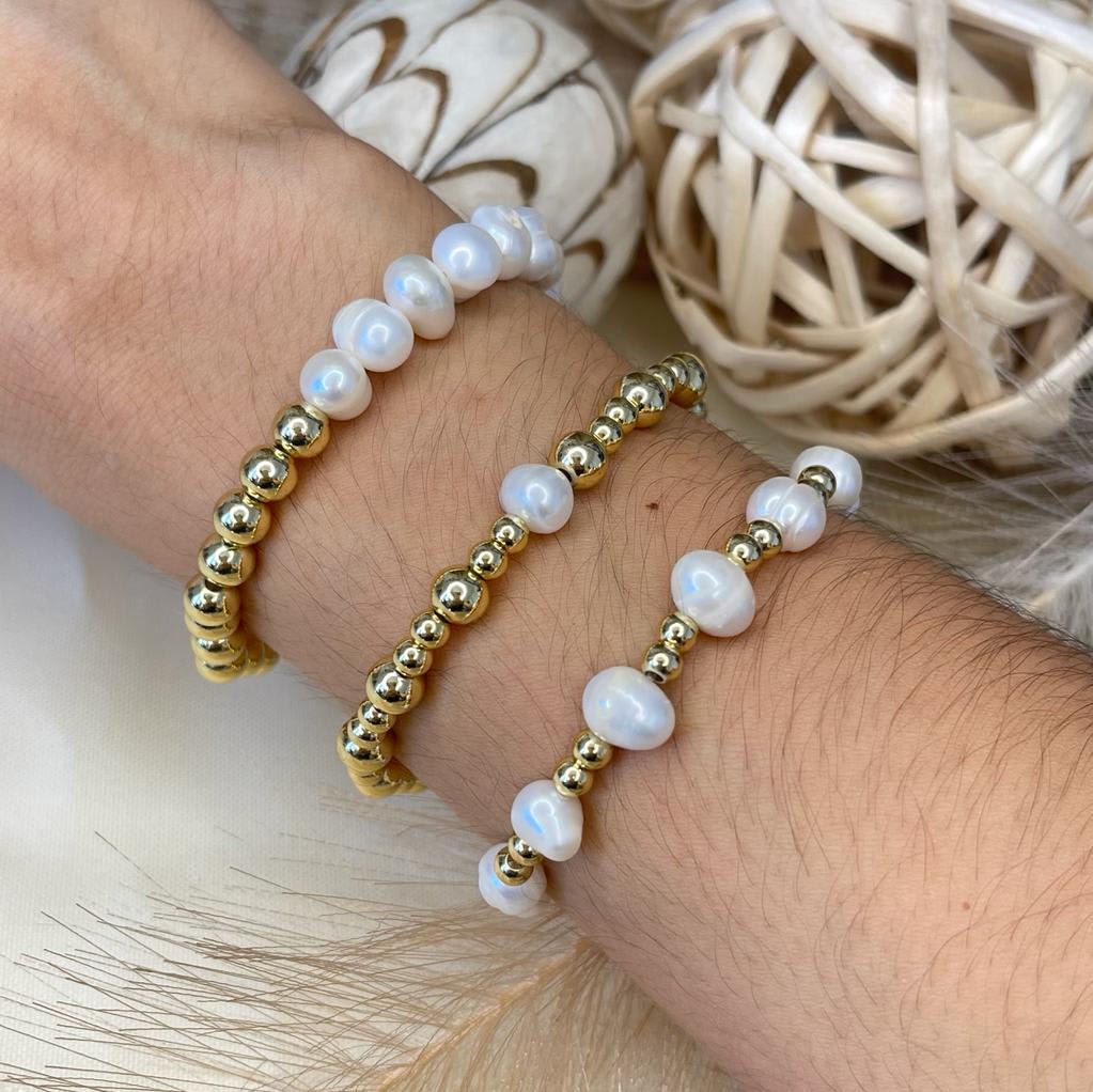 Pulsera elasticada de balines en acero y perlas / unidad5