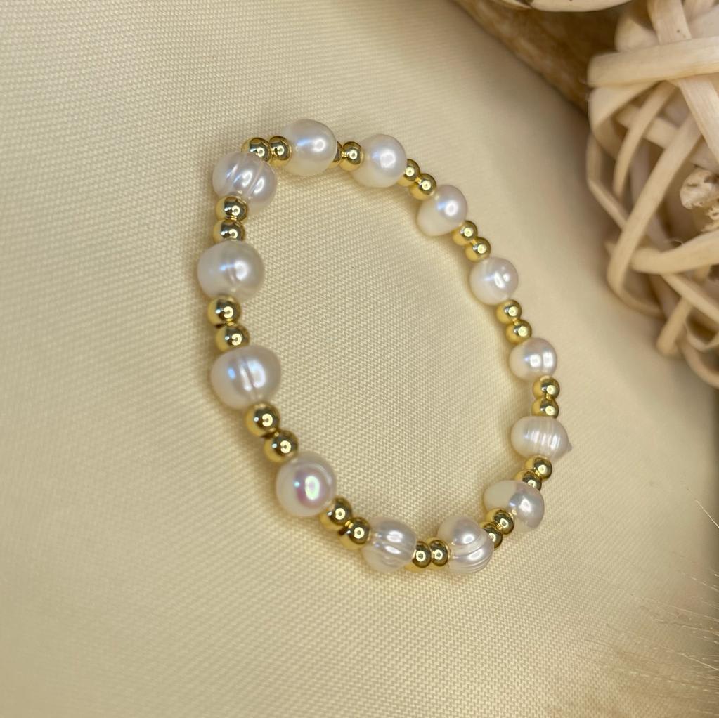 Pulsera elasticada de balines en acero y perlas / unidad8