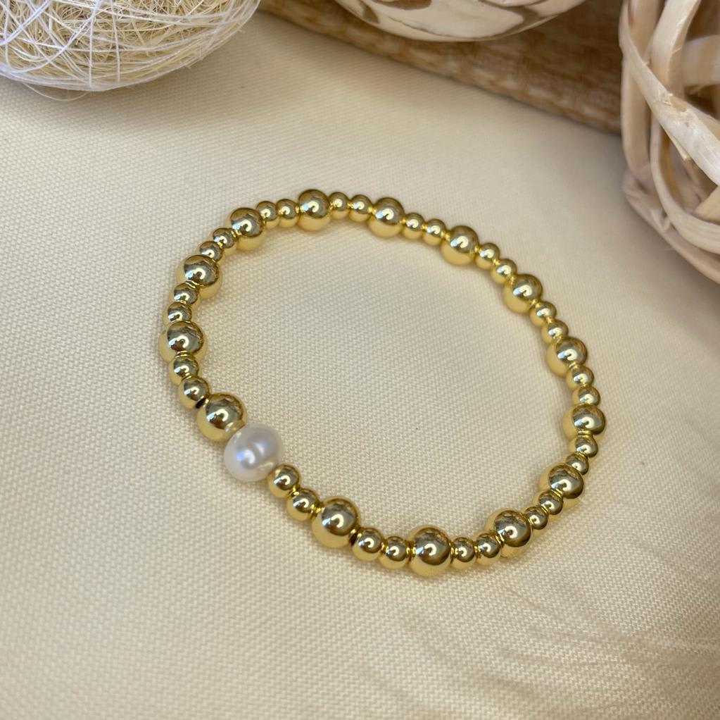 Pulsera elasticada de balines en acero y perlas / unidad6