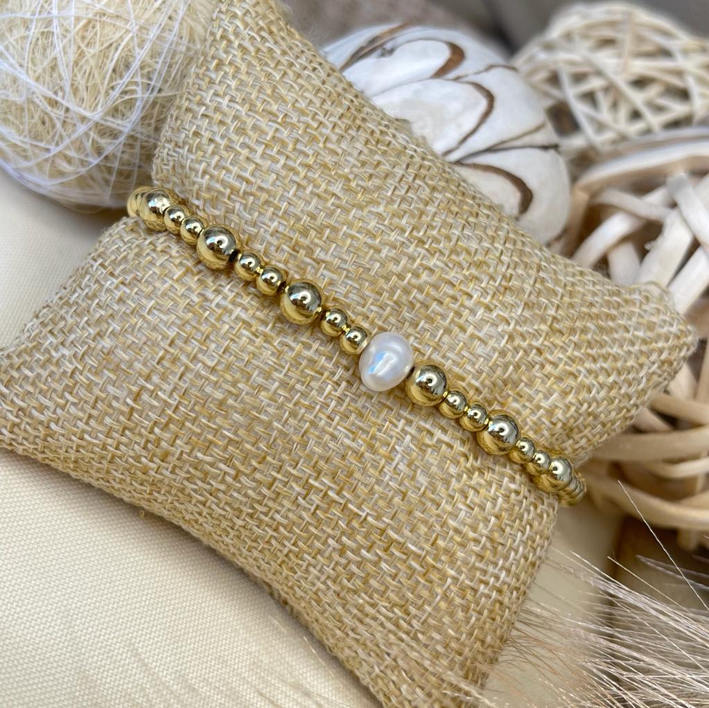 Pulsera elasticada de balines en acero y perlas / unidad3