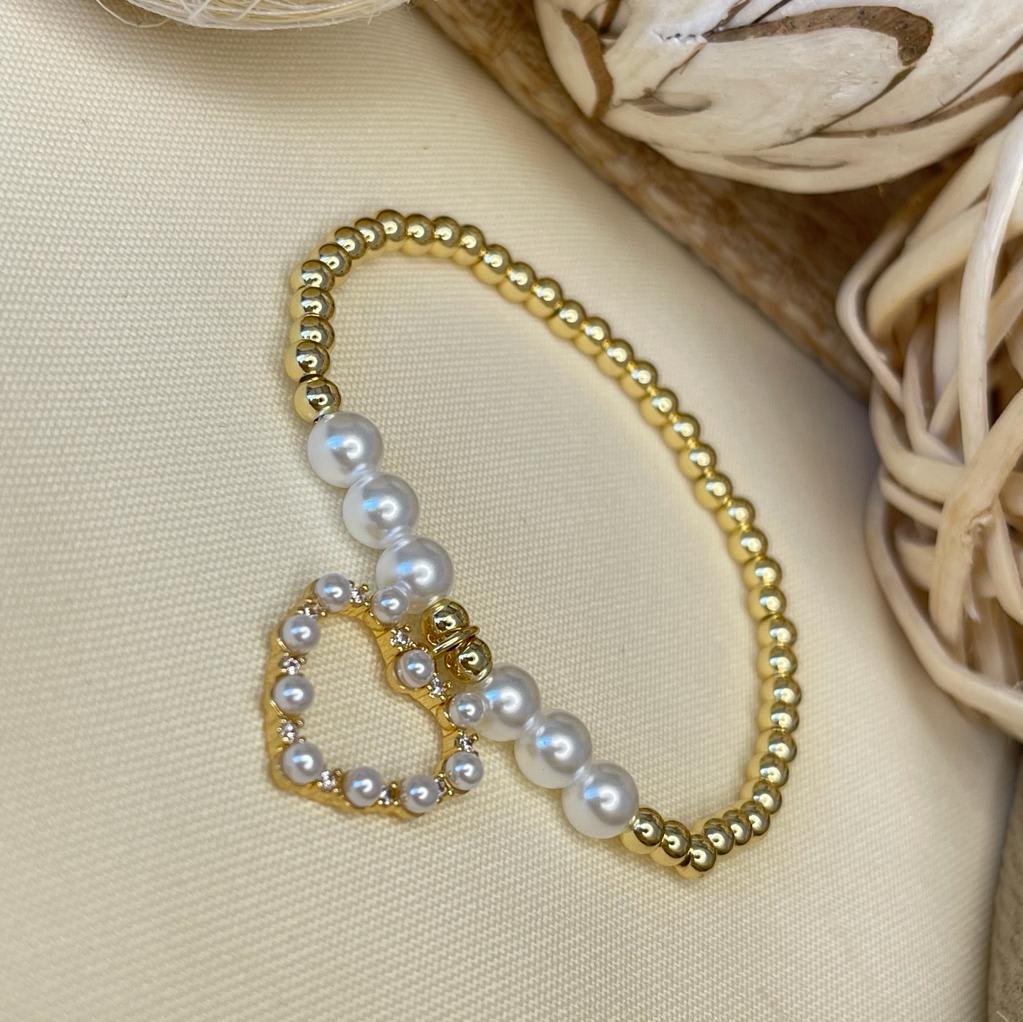 Pulsera elasticada de balines acero perla colgante / unidad10