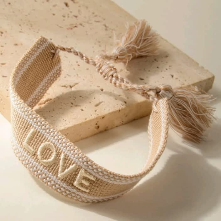 Pulsera ajustable de tela género con palabra bordada / unidad3