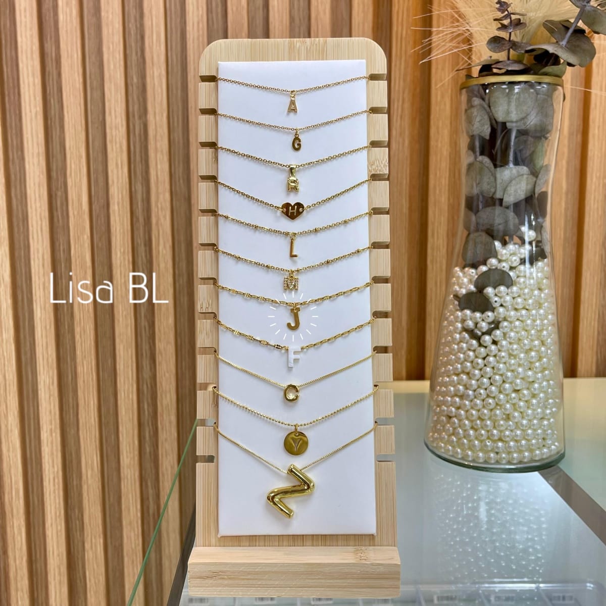 Collar con letra inicial VTE / unidad9